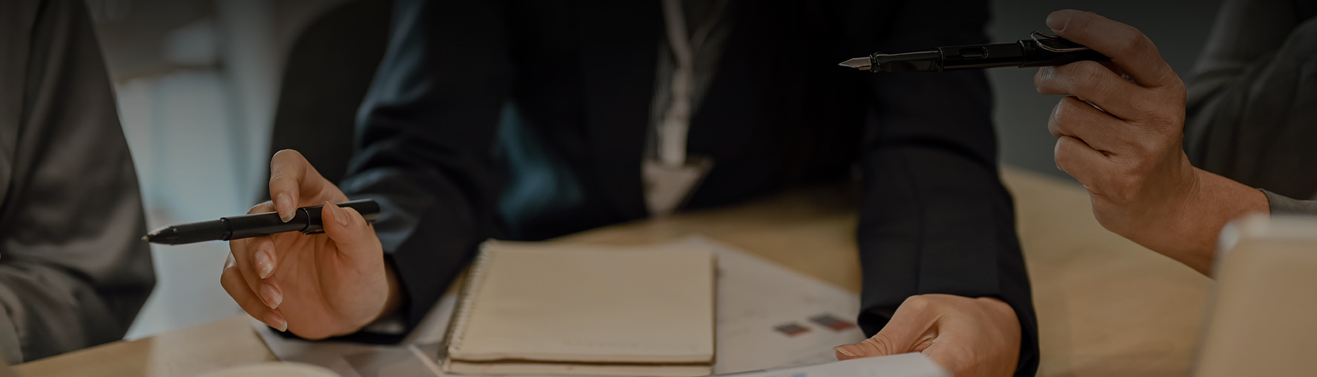 a person holding a pen