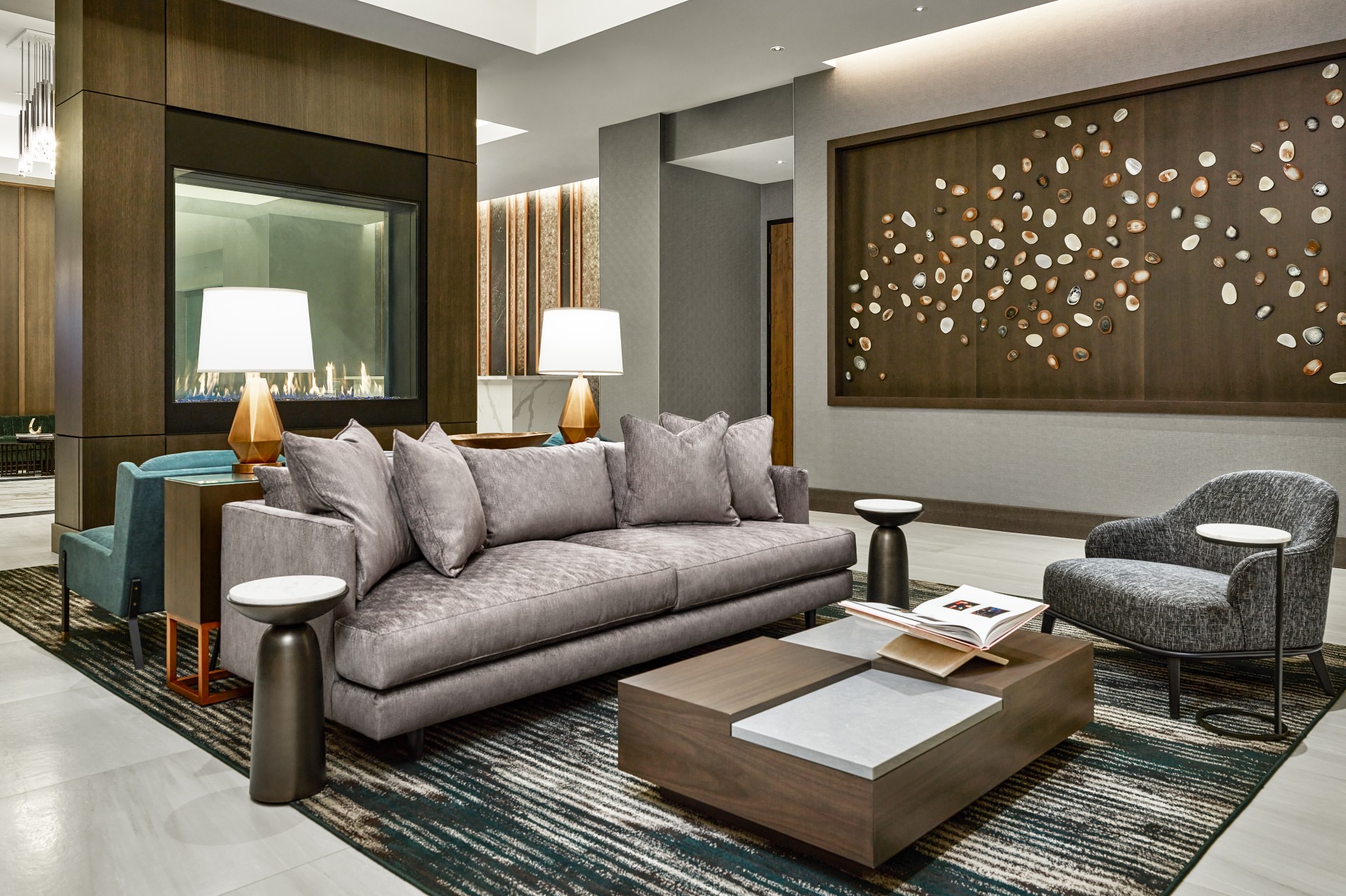 a living room with a couch and a fireplace