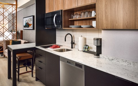 a kitchen with a sink and dishwasher