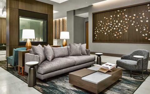 a living room with a couch and a fireplace