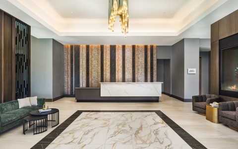 a lobby with a marble floor and a marble floor