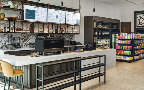 a coffee shop with shelves and shelves