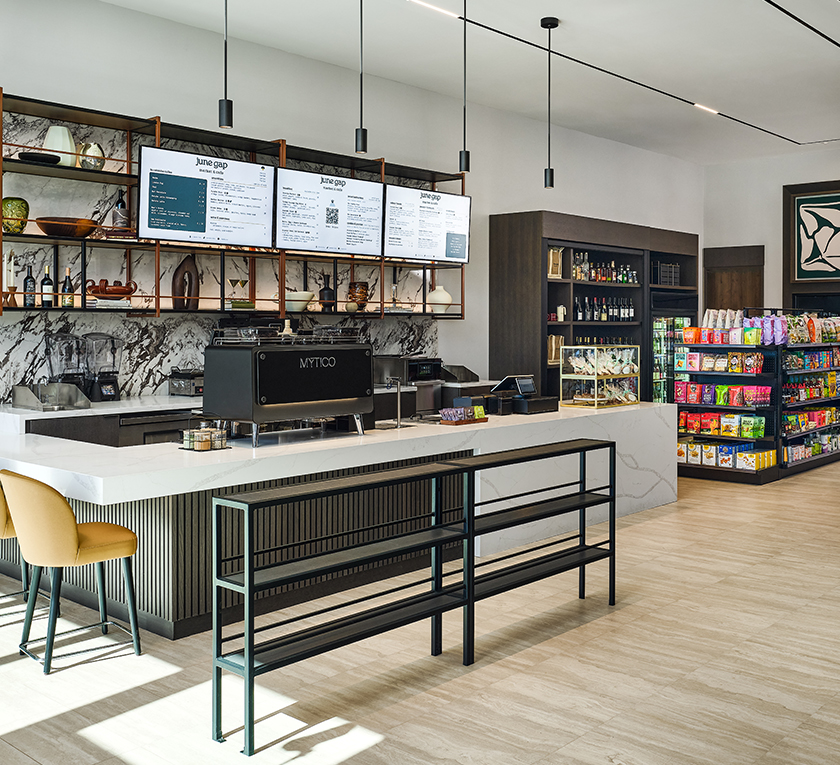 a coffee shop with shelves and shelves
