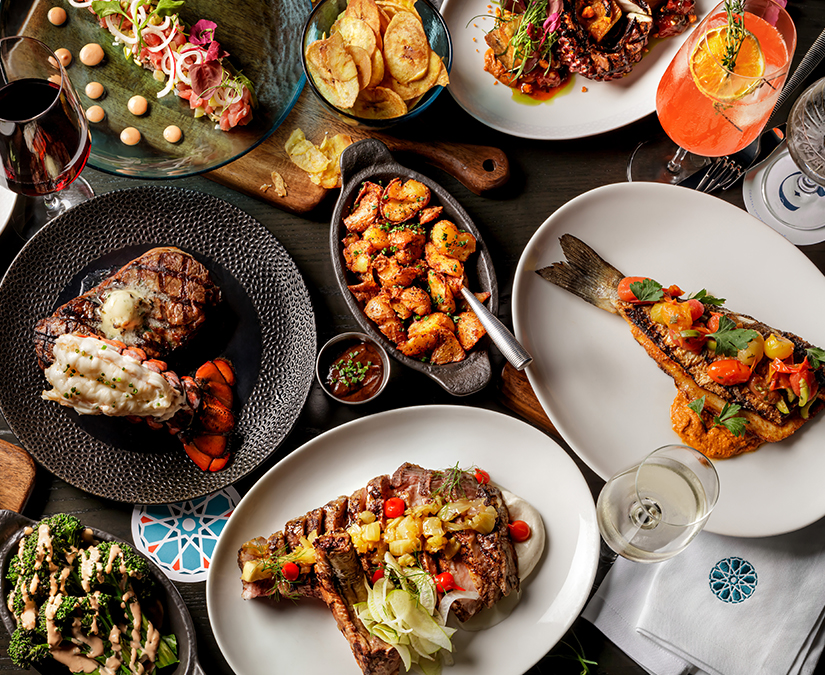 a table full of plates of food