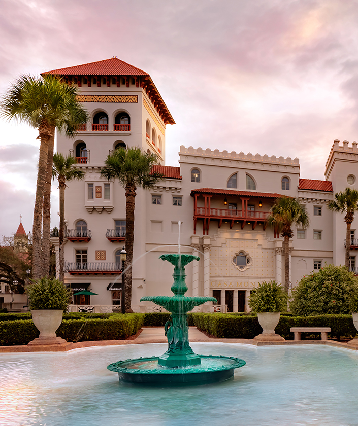 a fountain in front of a building