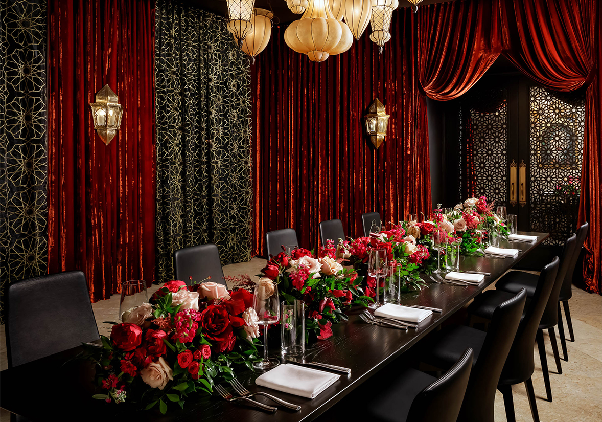 a long table with flowers on it