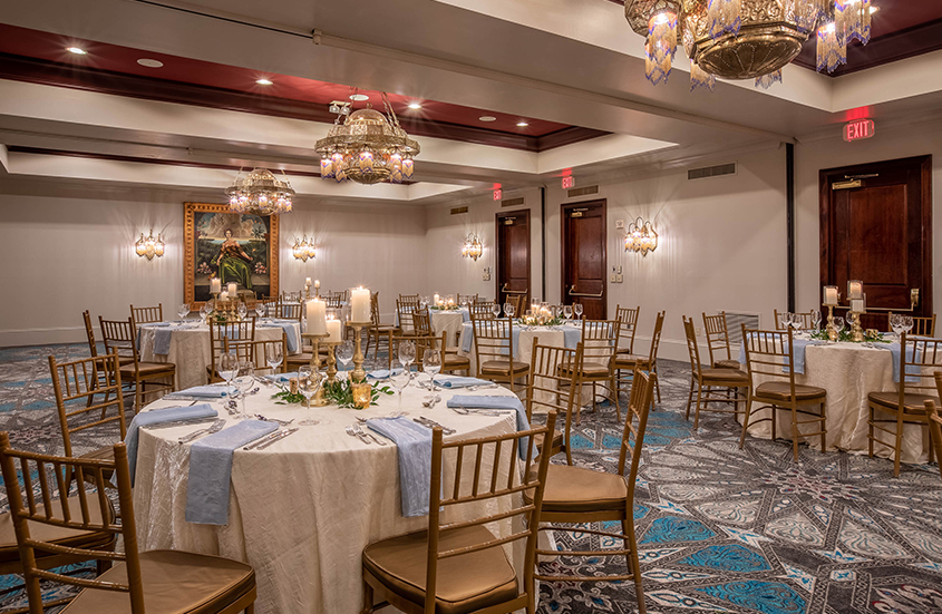 a room with tables and chairs