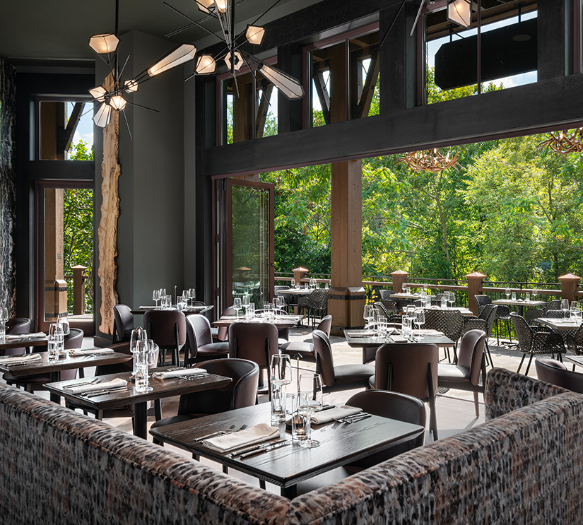 a restaurant with tables and chairs