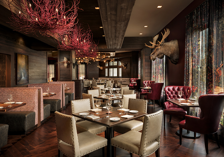a restaurant with tables and chairs
