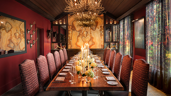 a long table with candles on it
