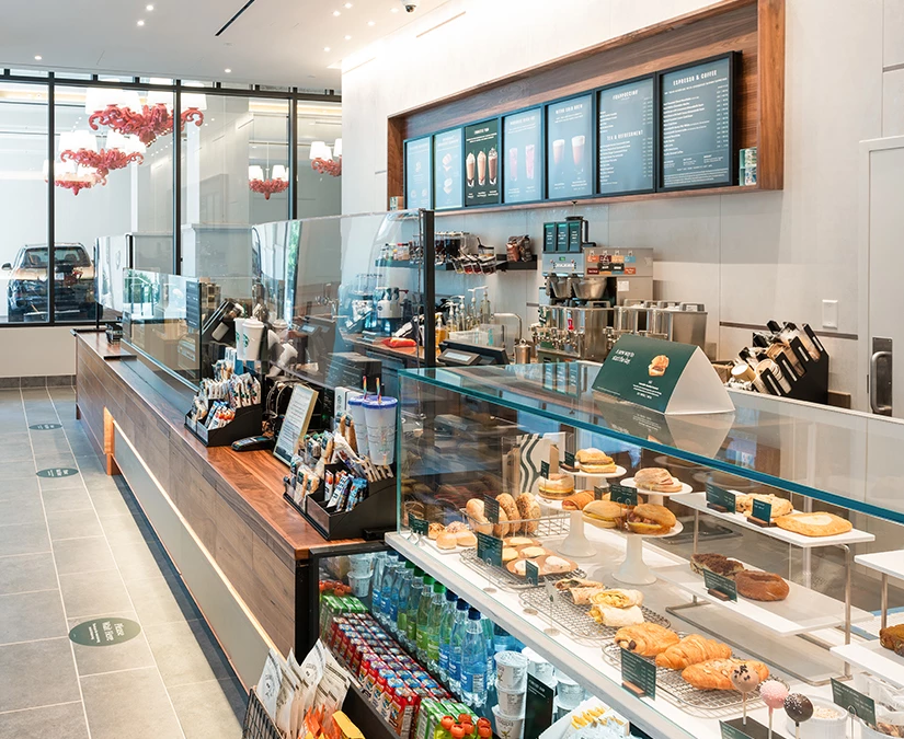 a display case of food and drinks