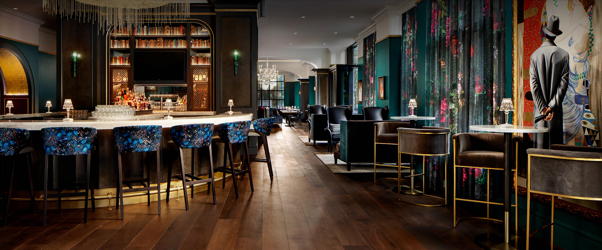 a room with a bar and chairs