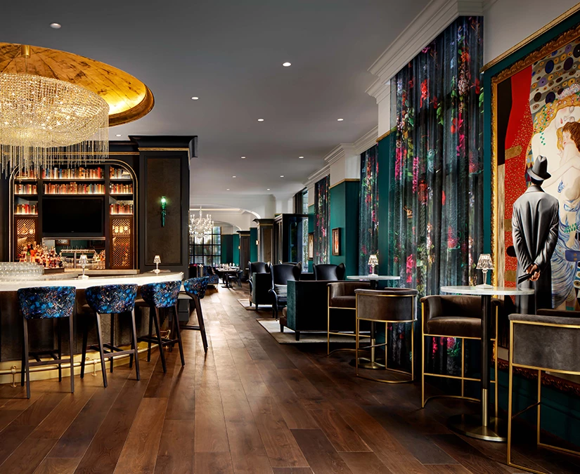 a room with a bar and a large table