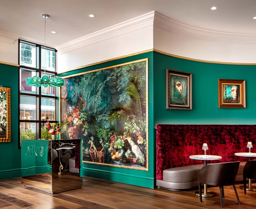 a room with a painting on the wall