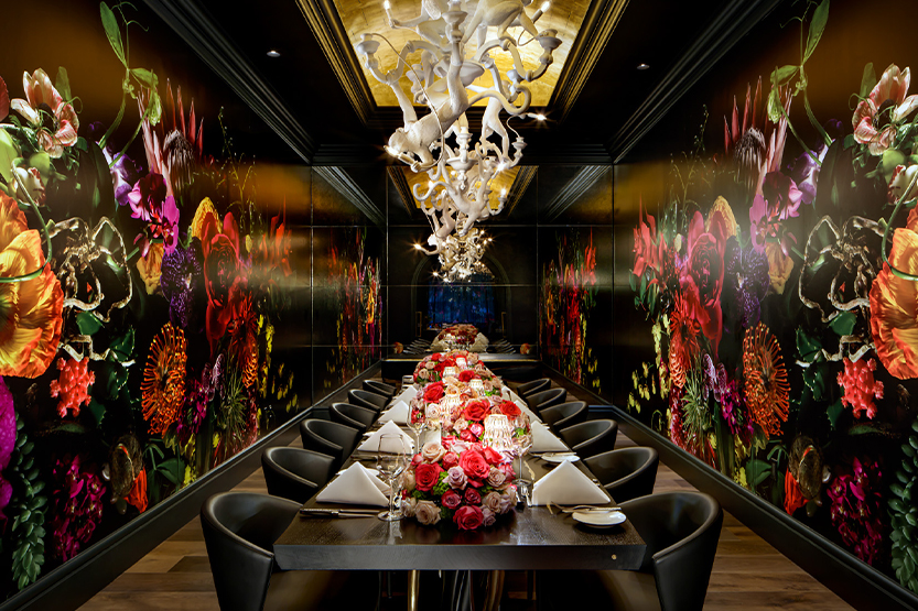 a long table with flowers on it