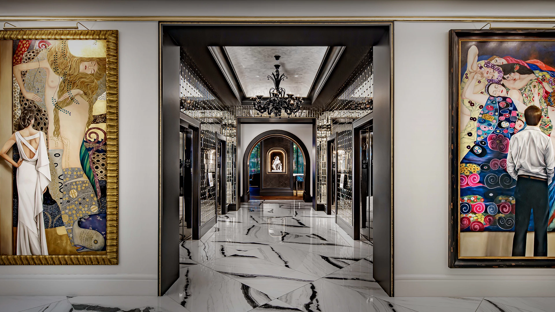 a hallway with a marble floor and a chandelier