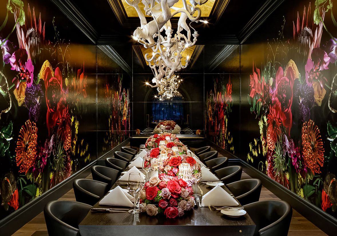 a long table with flowers on it