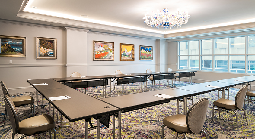 a room with tables and chairs