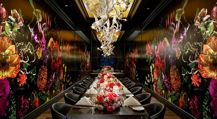 a long table with flowers on it