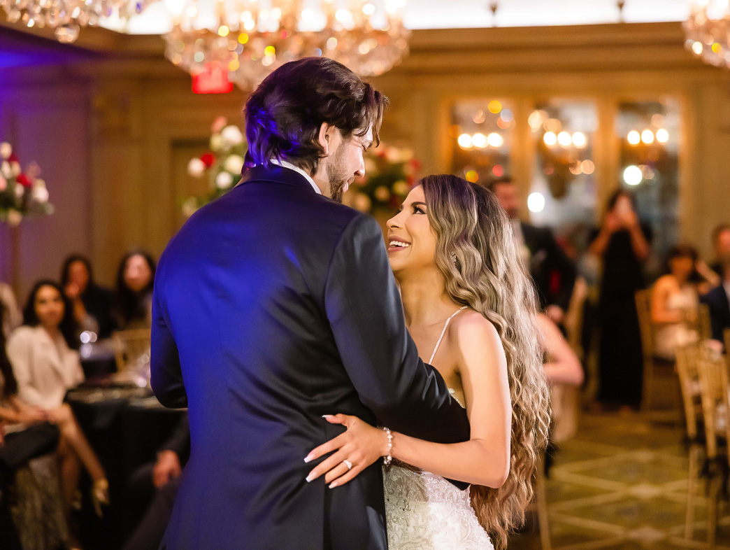 a man and woman dancing in a room