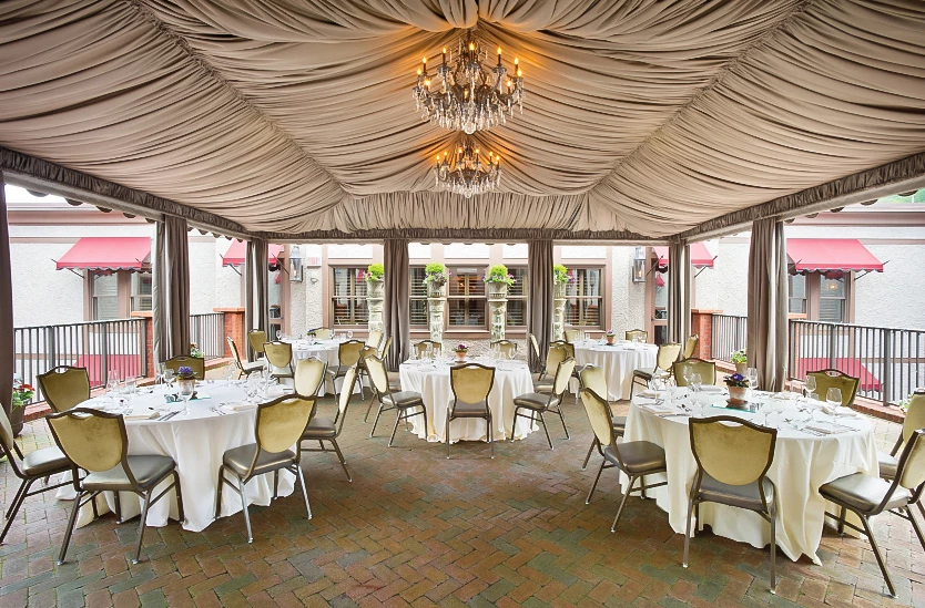 a room with tables and chairs