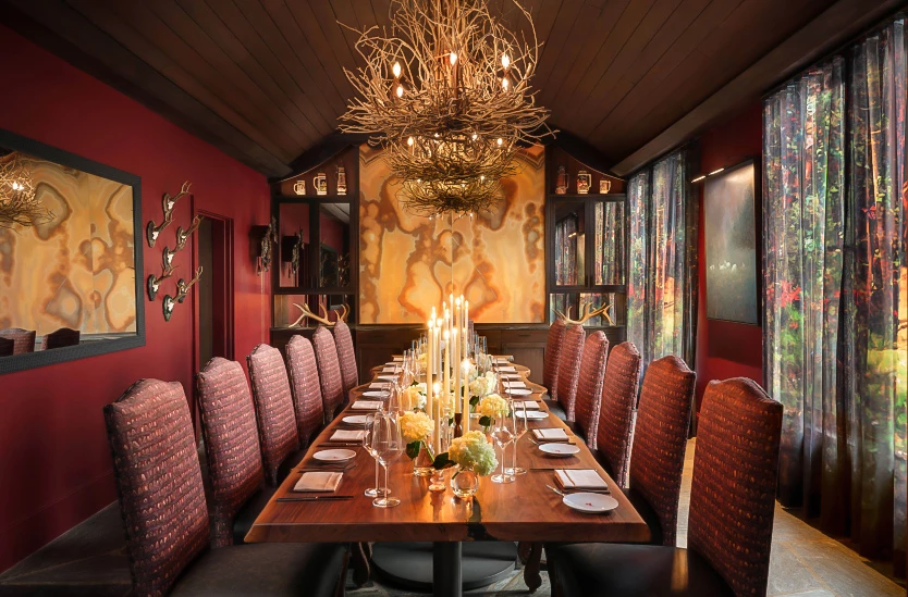 a long table with candles on it
