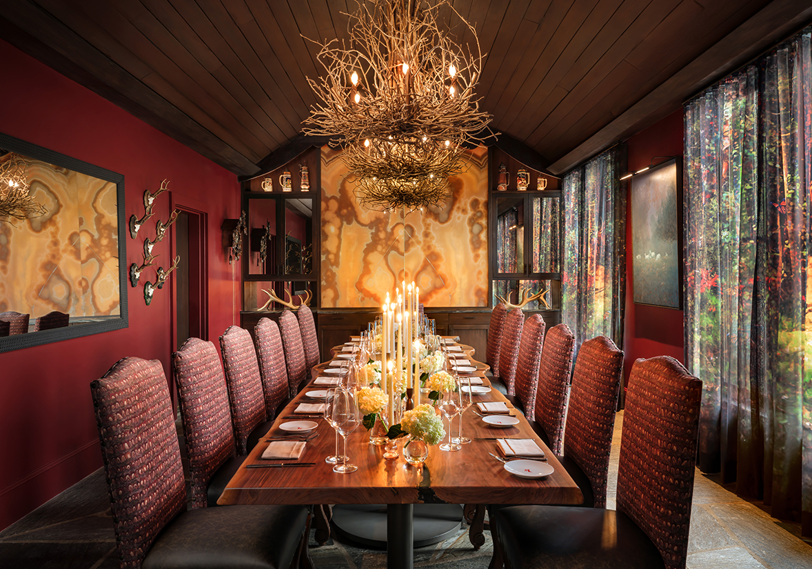 a long table with candles on it