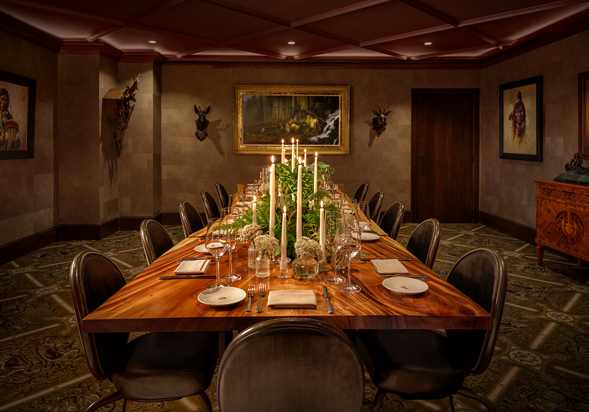 a long table with candles on it