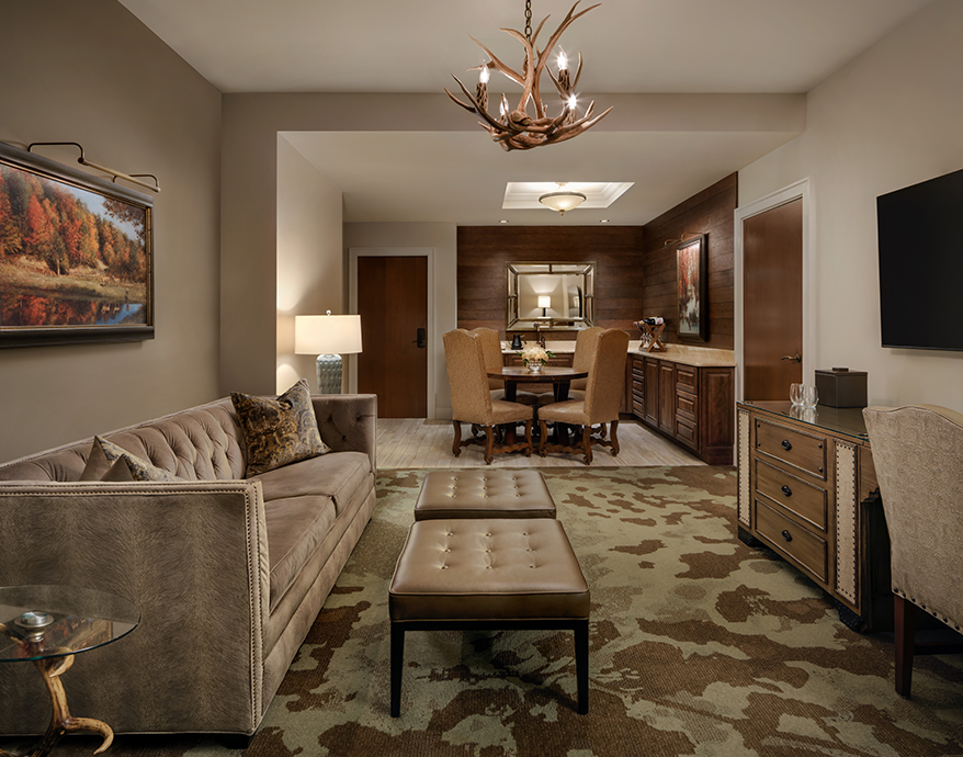 a living room with a couch and a table