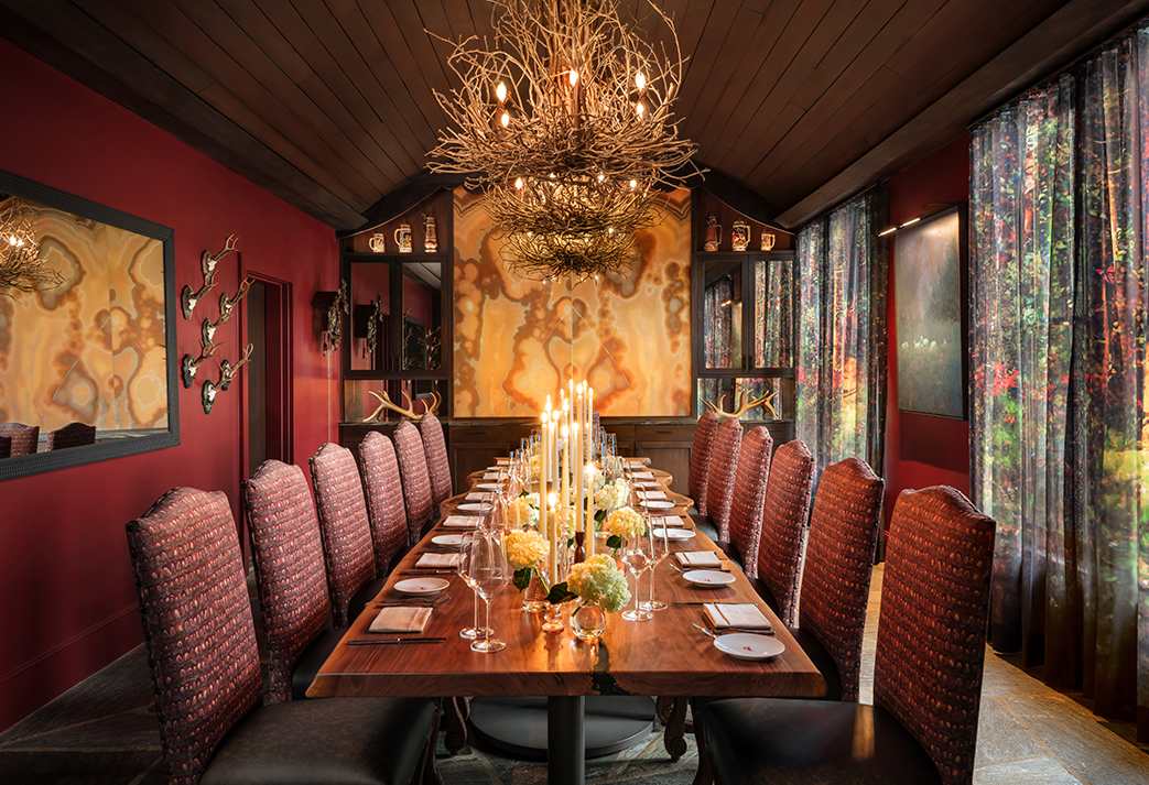 a long table with candles on it