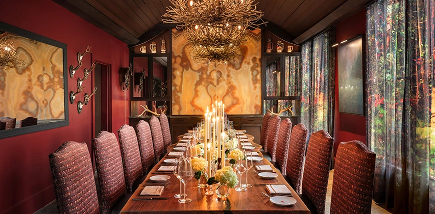a long table with candles on it