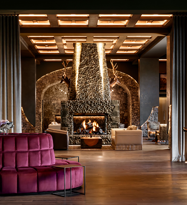a room with a fireplace and a couch