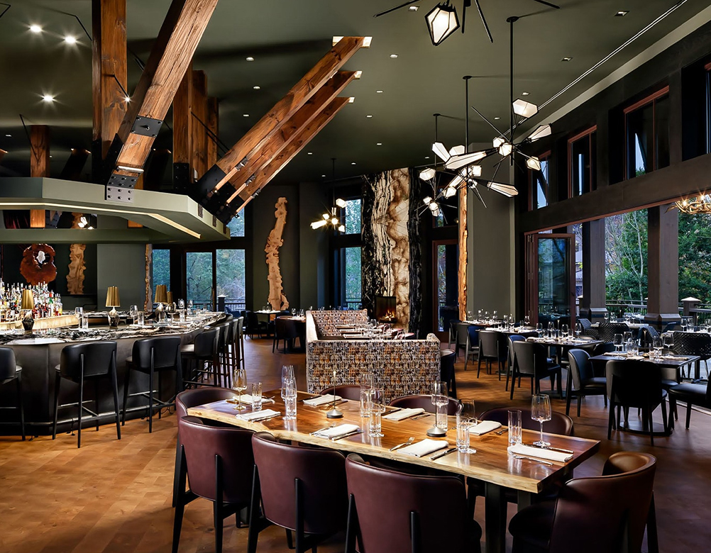a restaurant with tables and chairs
