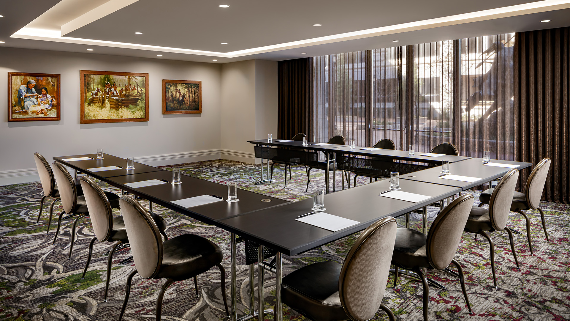 a room with tables and chairs