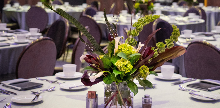 a vase of flowers on a table