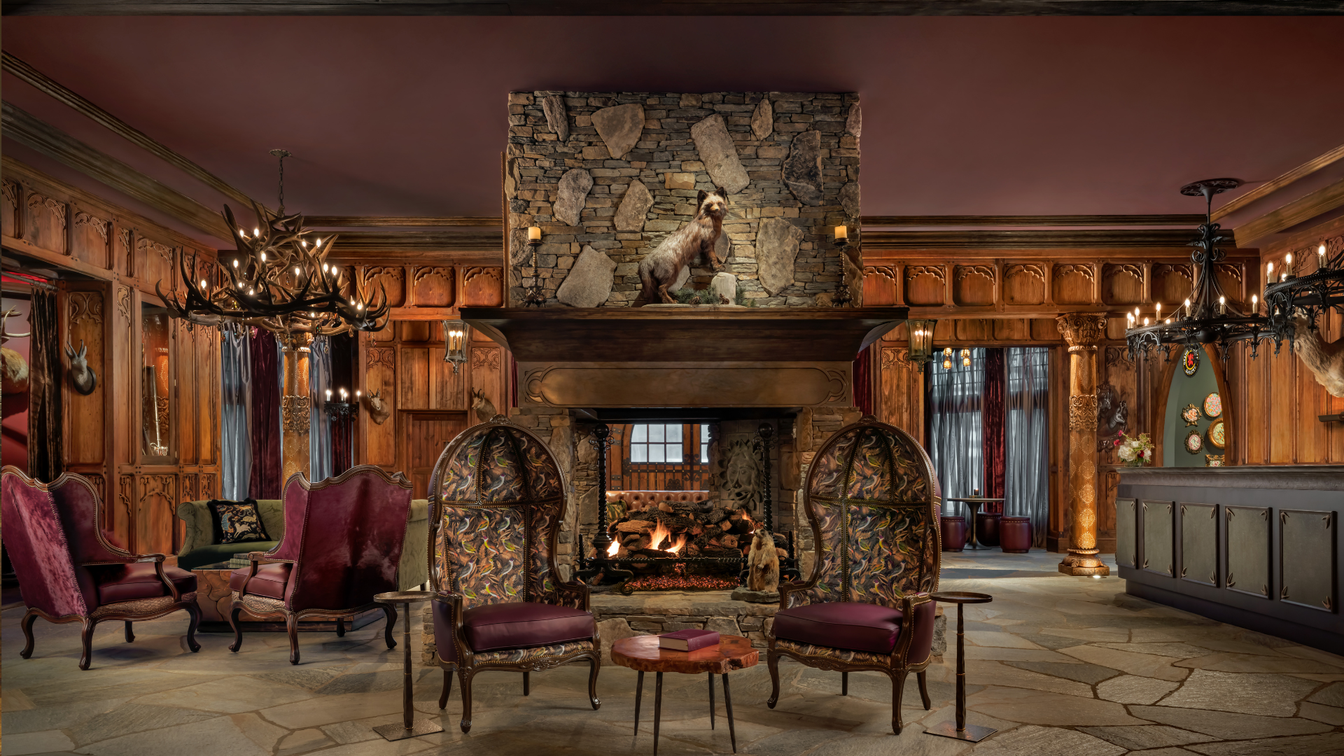 a room with chairs and a fireplace
