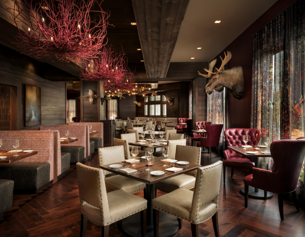 a restaurant with tables and chairs