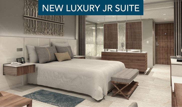 a bedroom with a bed and a mirror