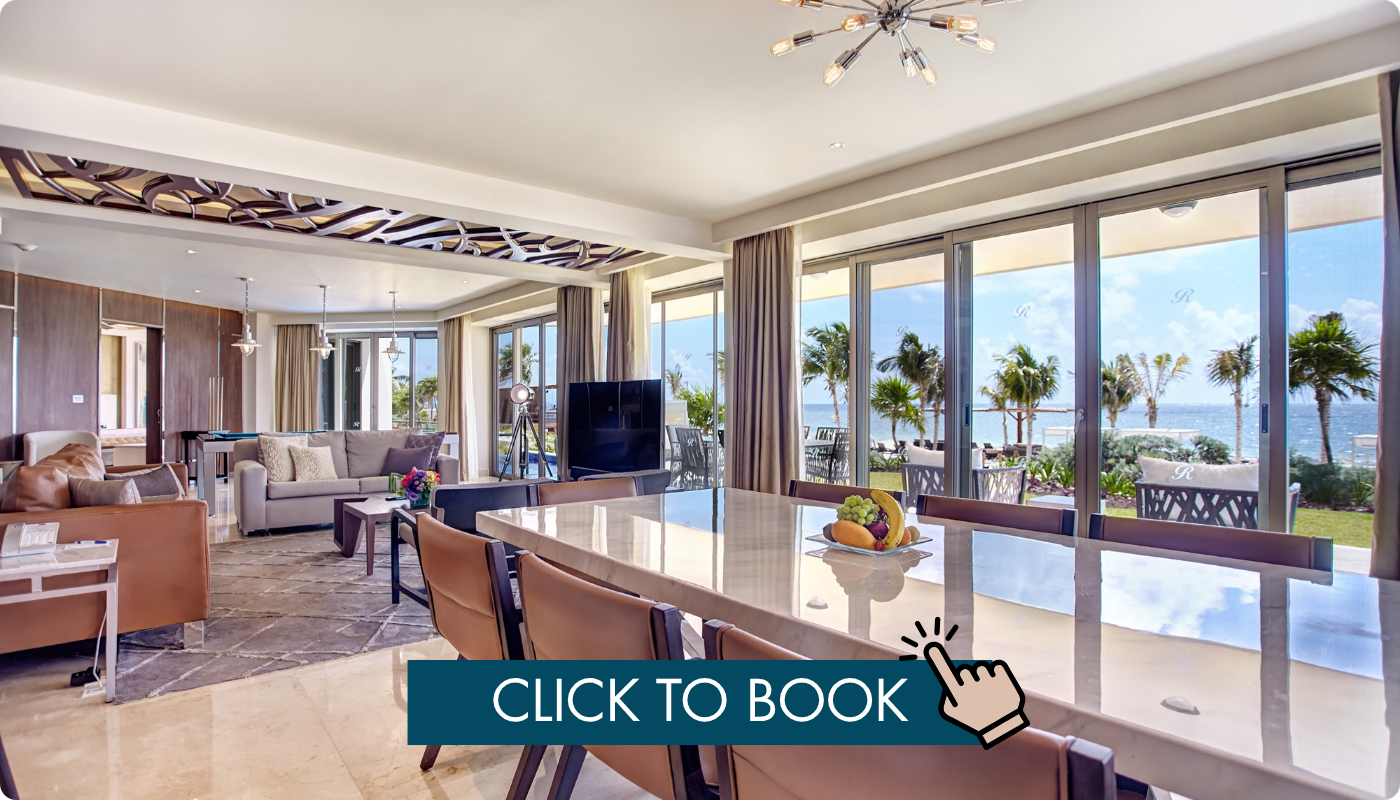 a room with a large table and chairs
