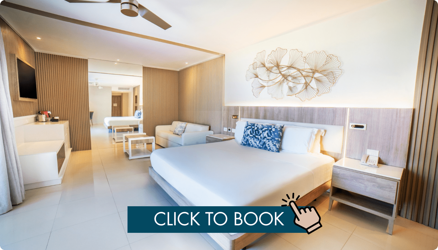 a room with a bed and a fan