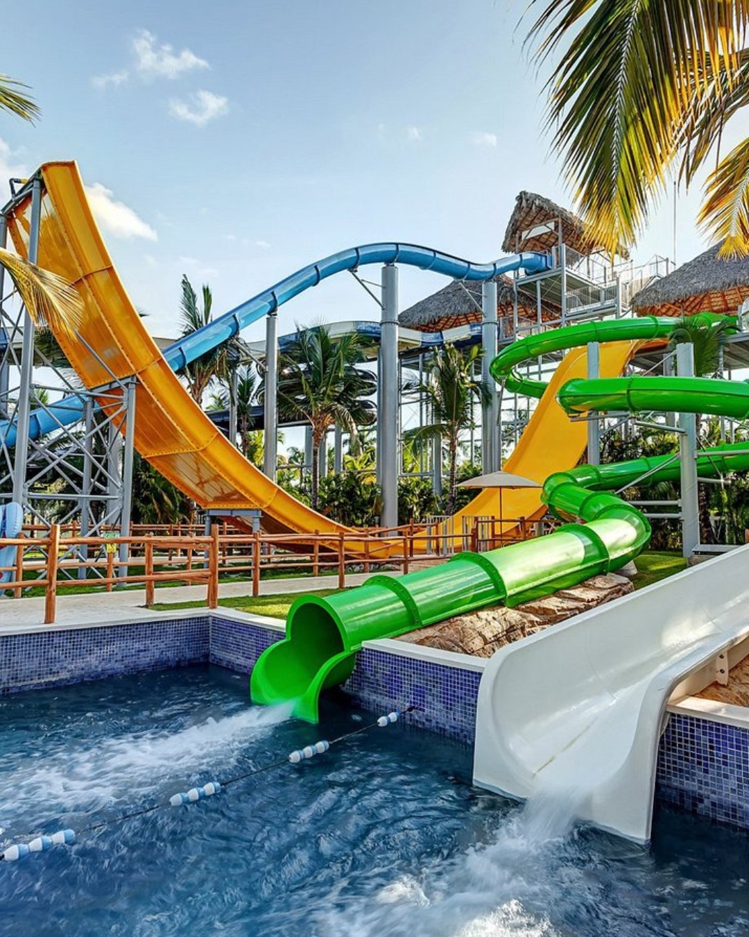 a water park with a pool and slides