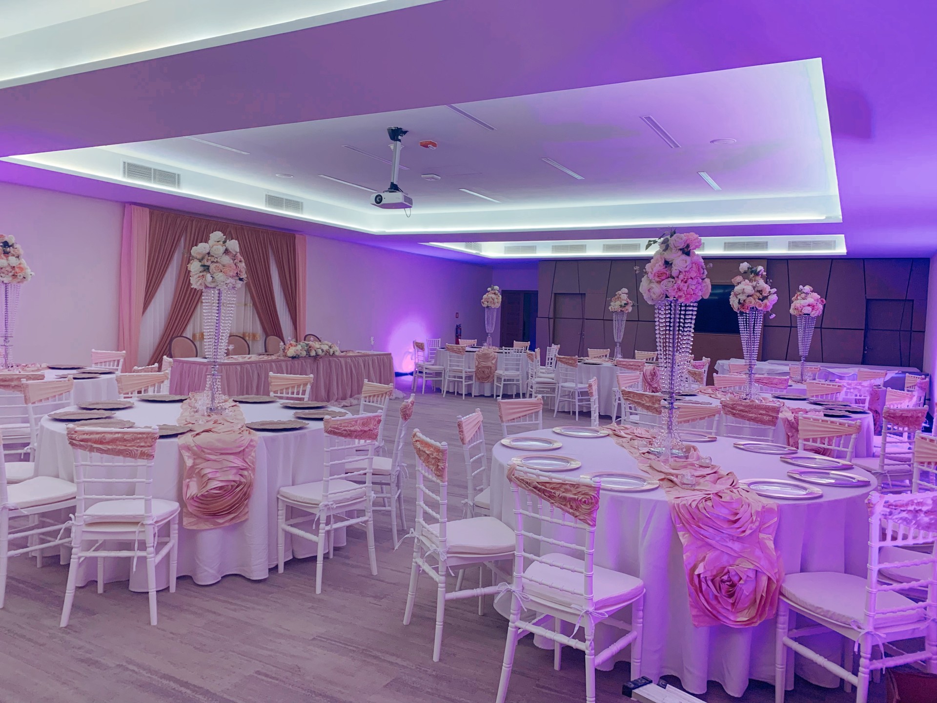 a room with tables and chairs