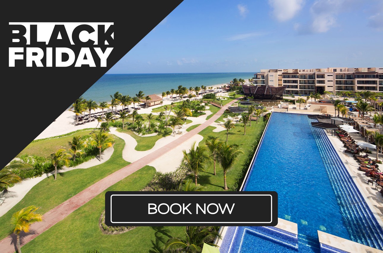 a pool and buildings near the beach