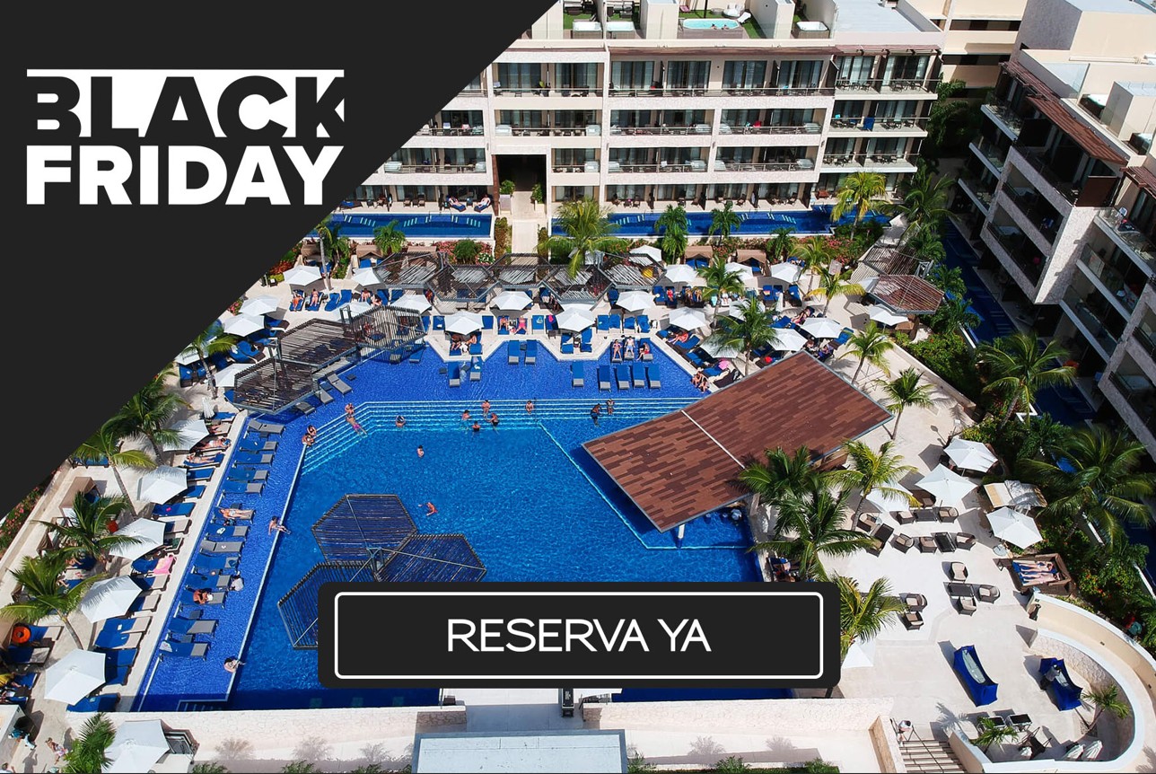 a pool with lounge chairs and umbrellas