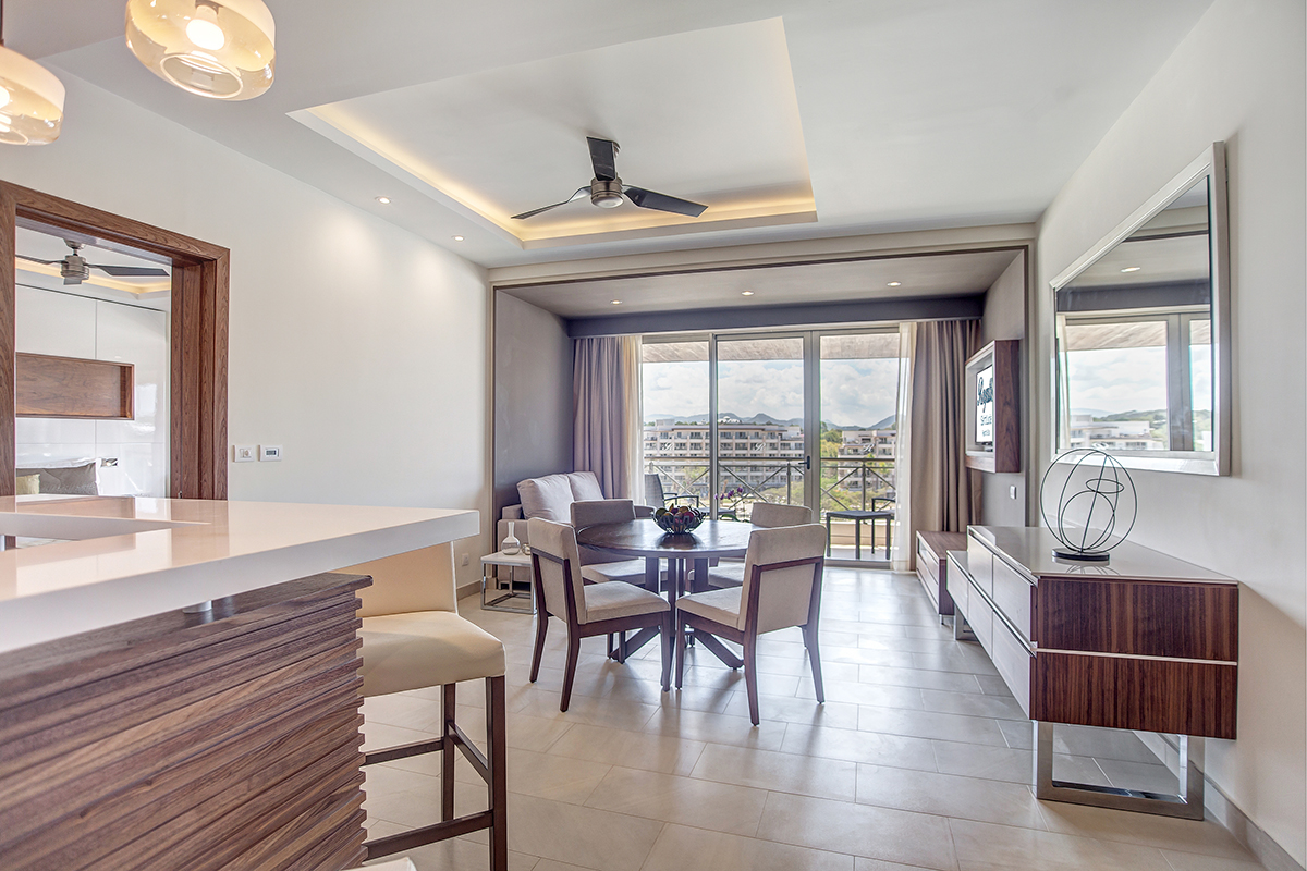 a room with a table and chairs