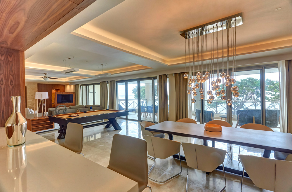 a room with a pool table and a pool table