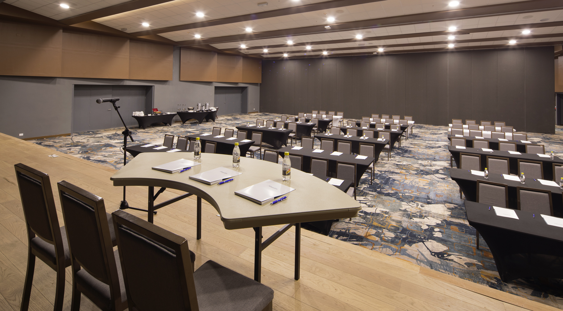 a room with tables and chairs