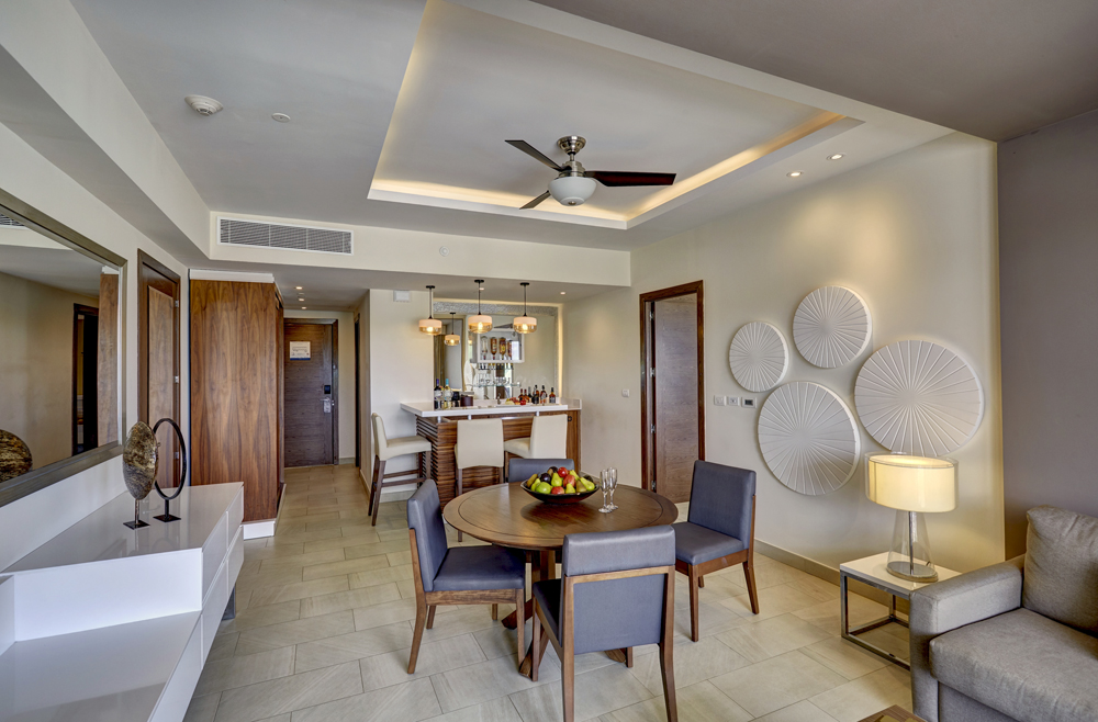 a room with a table and chairs