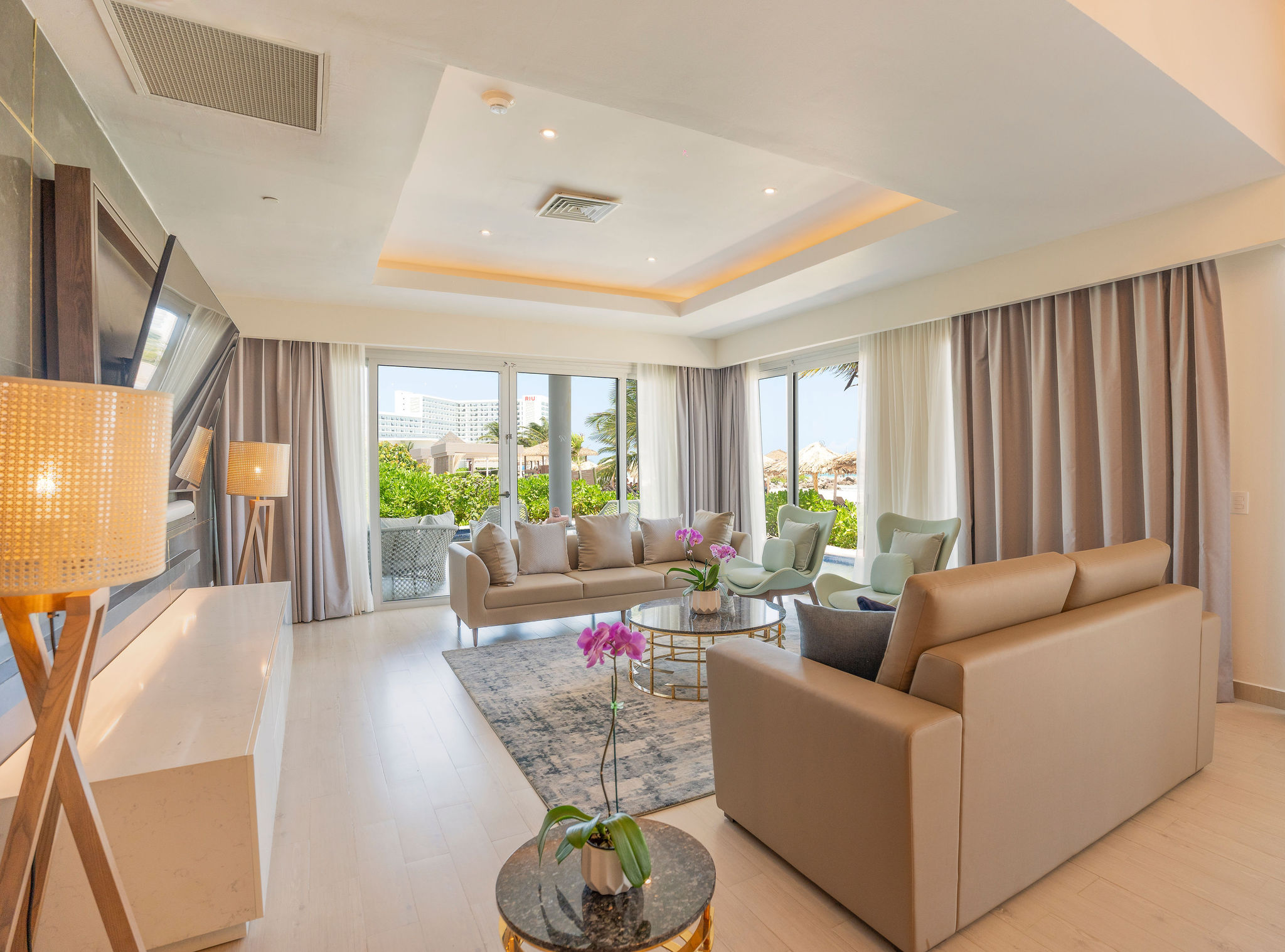 a living room with couches and a television