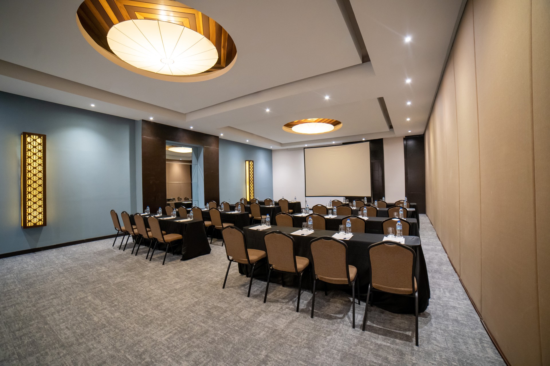 a room with tables and chairs